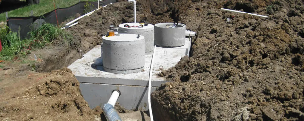 Septic system repair and installation site with tank access ports in Atlanta, GA